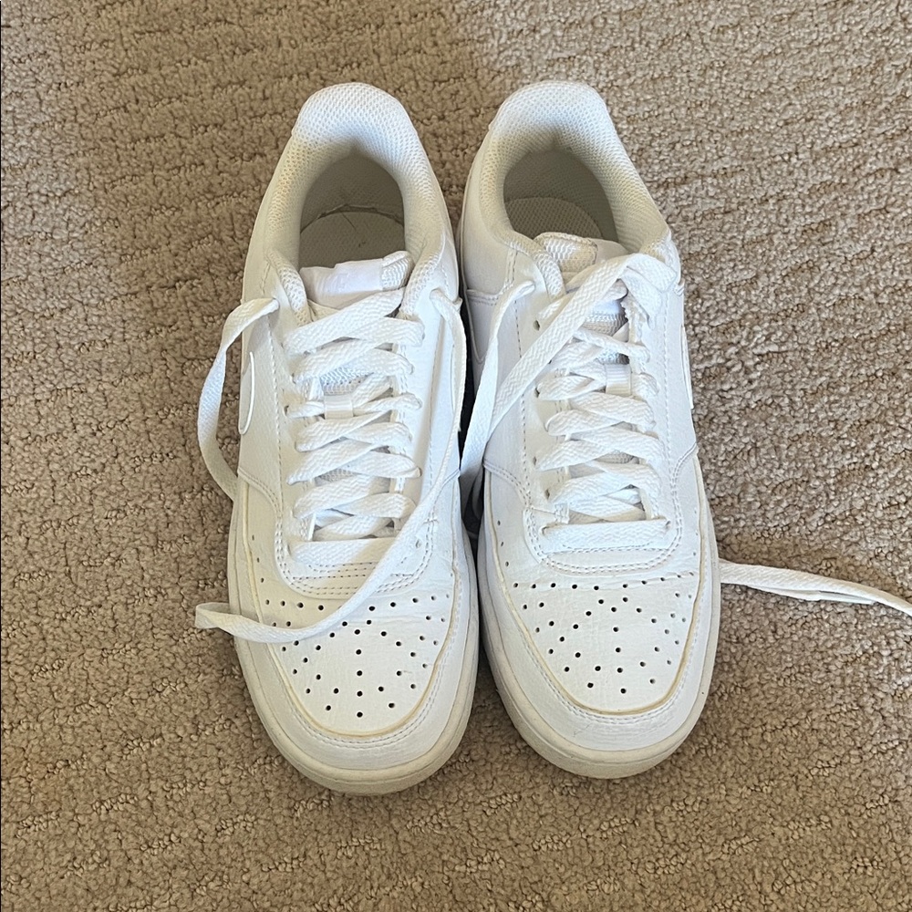 Women’s white Nikes